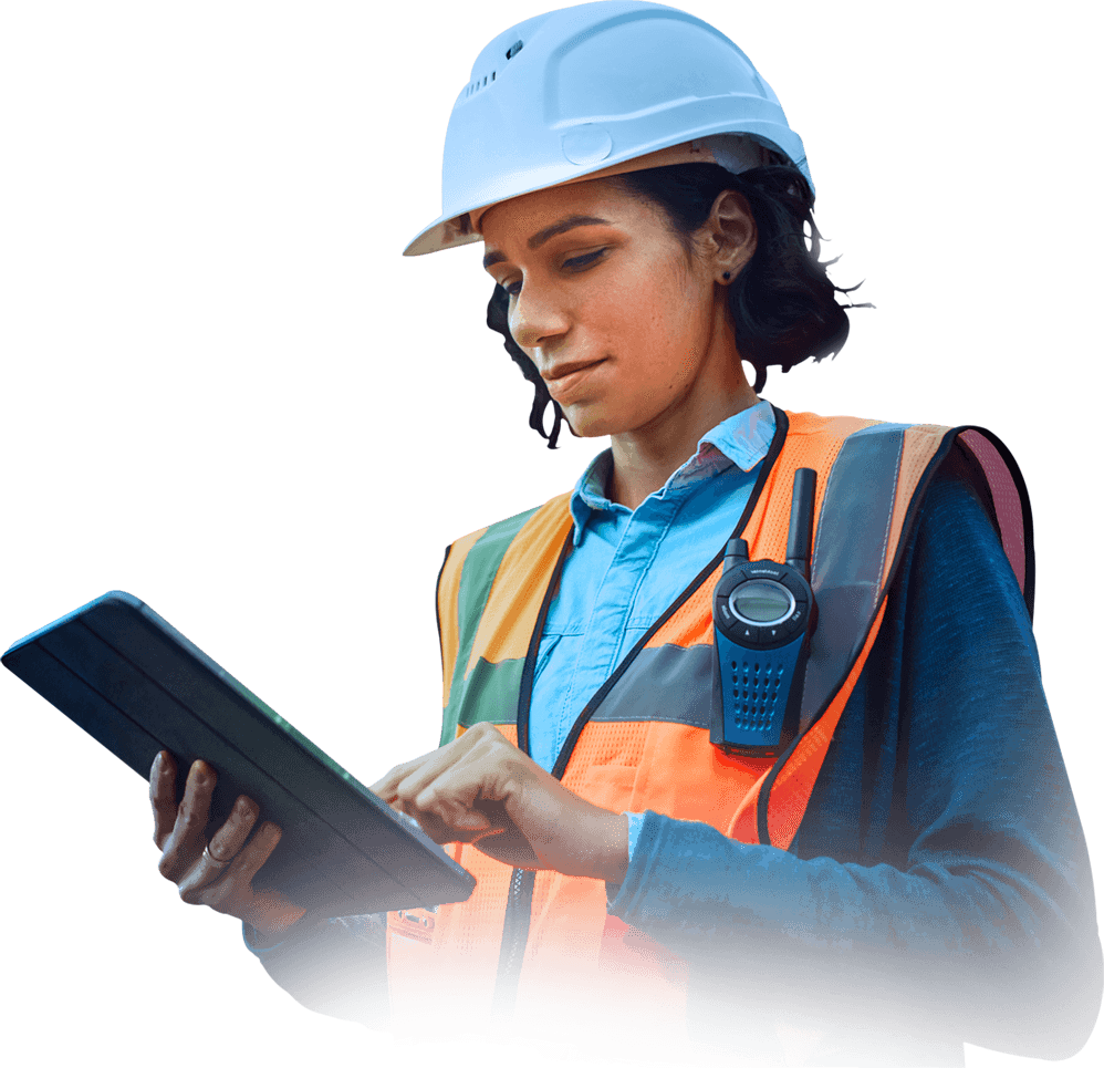 construction worker watching a tablet