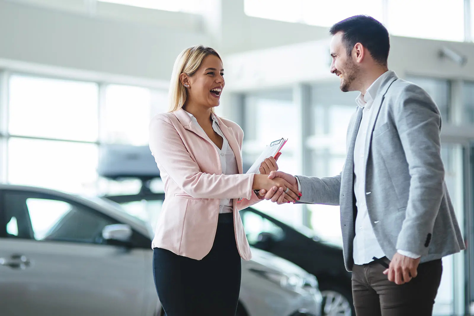 sales executive closes a deal with a client.