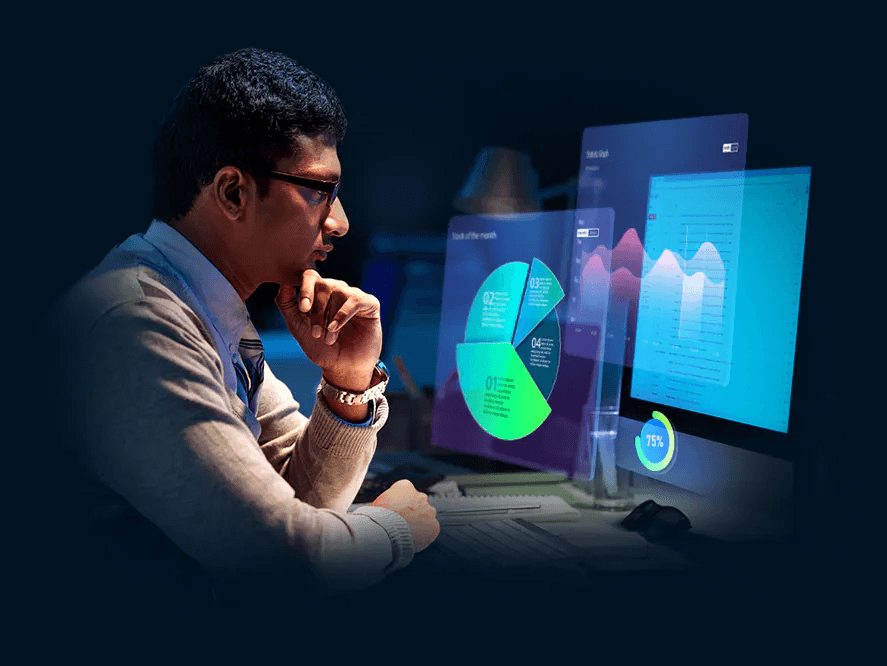 Thoughtful man looking at data graphs on his computer screen